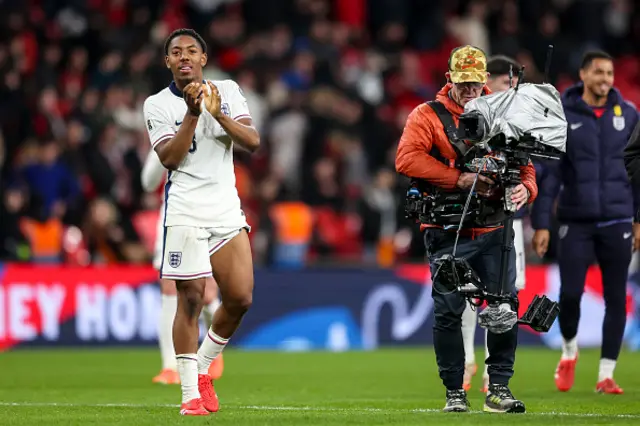 Myles Lewis-Skelly of England applauds fans