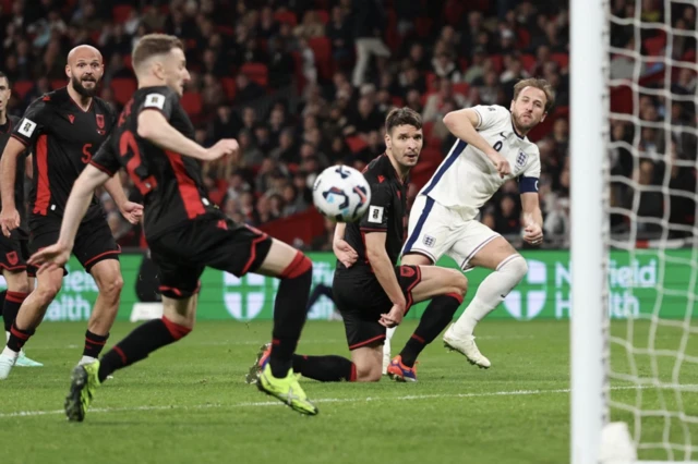 England's Harry Kane scores their second goal