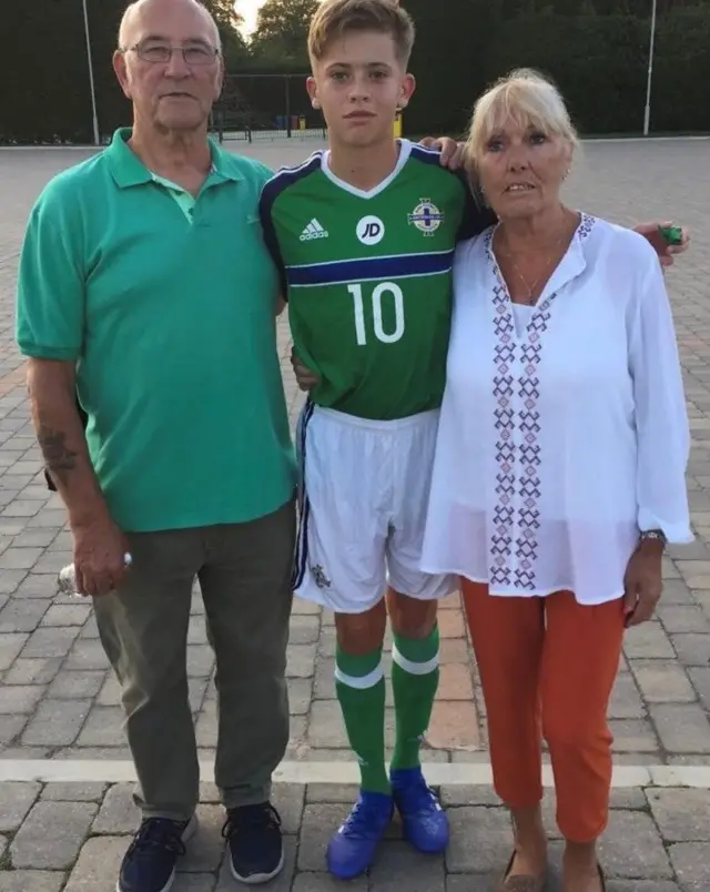 Isaac Price with his grandmother and grandfather