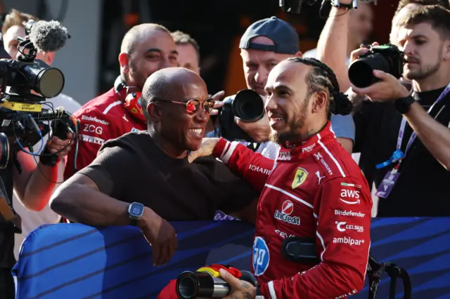 Lando Norris celebrates taking sprint pole in Shanghai with his dad, Anthony