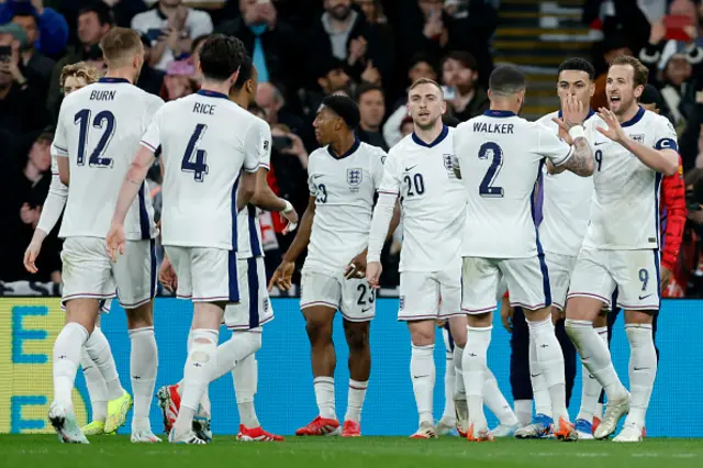 Myles Lewis-Skelly, Jarrod Bowen, Kyle Walker, Morgan Rogers and Harry Kane of England celebrate the second goal