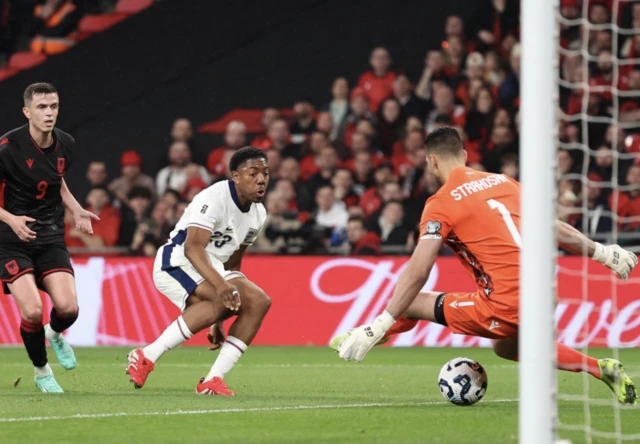 England's Myles Lewis-Skelly scores