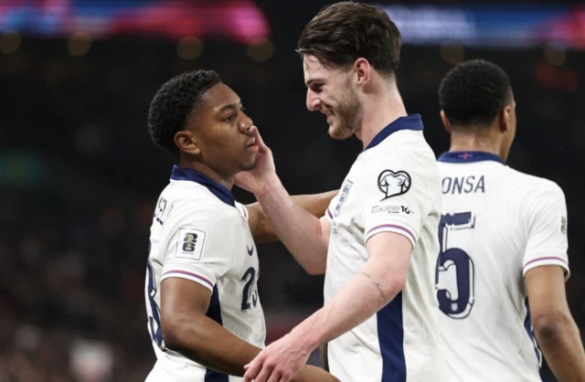 England's Myles Lewis-Skelly celebrates scoring their first goal with Declan Rice