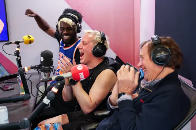 Jerry, Jamie and Jamie's dad smiling and laughing