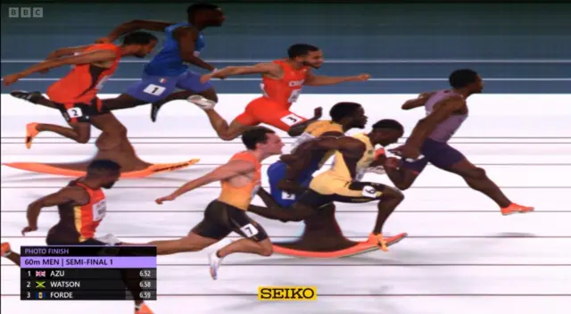 Britain's Jeremiah Azu wins his 60m semi-final