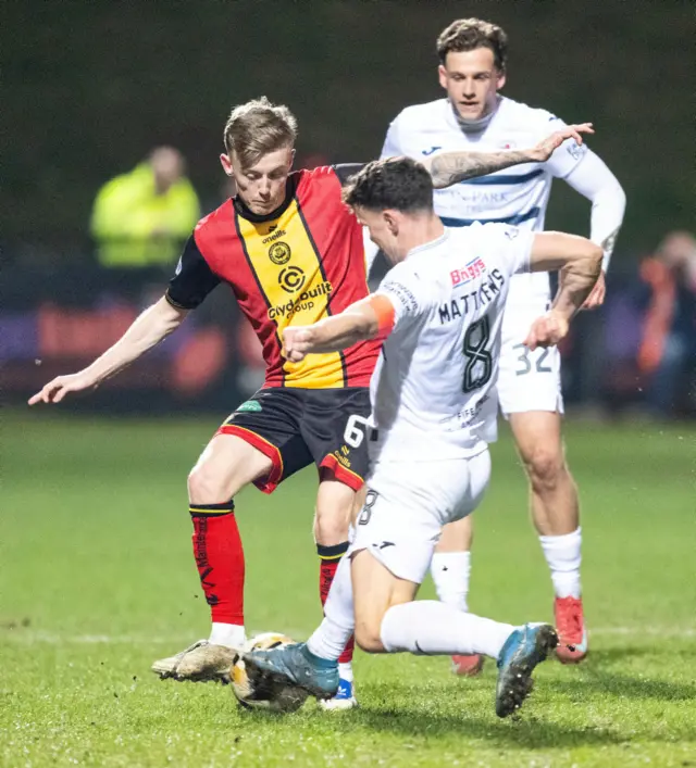 GLASGOW, SCOTLAND - MARCH 22: Partick's Kyle Turner (L) in action during a William Hill Championship match between Partick Thistle and Raith Rovers at the Wyre Stadium at Firhill, on March 22, 2025, in Glasgow, Scotland. (Photo by Paul Byars / SNS Group)