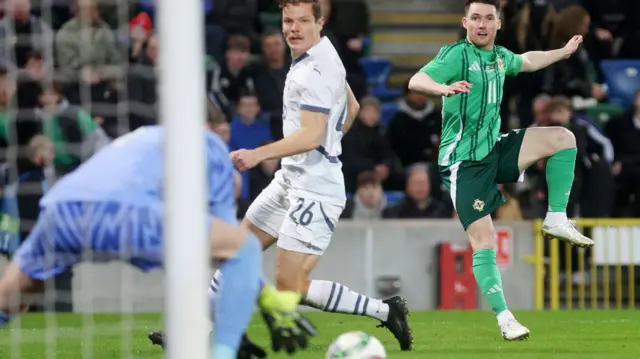 NI forward Paul Smyth shoots on the Swiss goal at Windsor Park