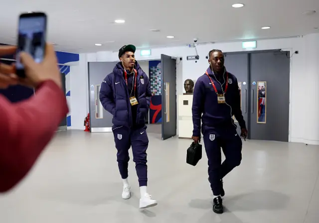 Marcus Rashford and Eberechi Eze of England arrive