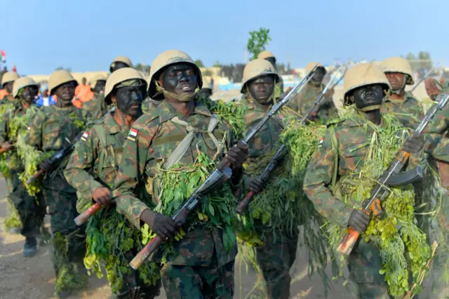 Members of the Sudanese army wearing camouflage