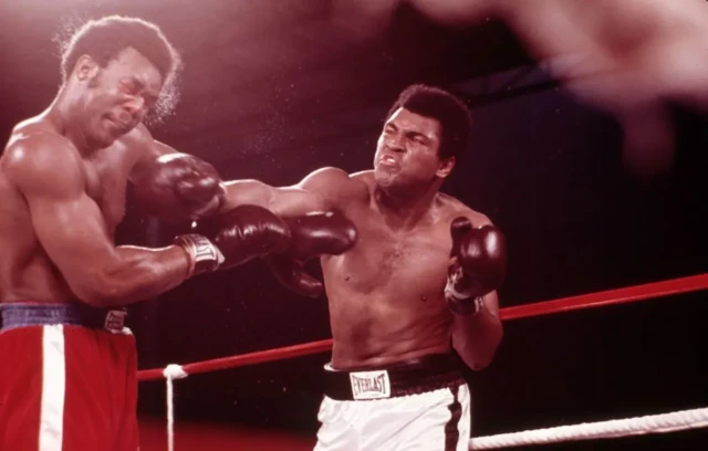 Muhammed Ali and George Foreman during the Rumble in the Jungle - Ali is seen striking foreman in the face with a right hand