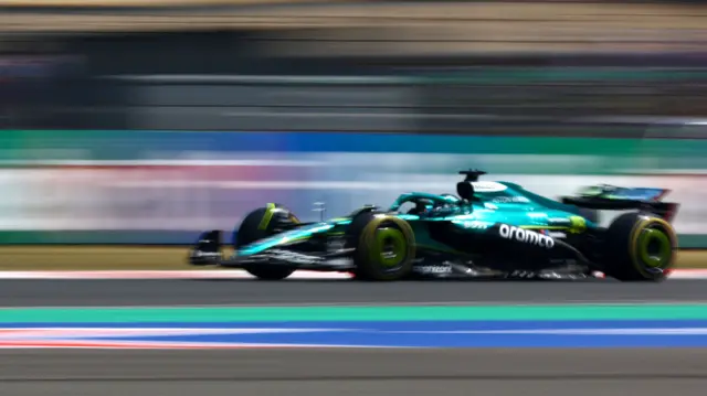 Lance Stroll driving his Aston Martin in Shanghai, China