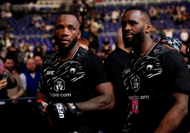 Leon Edwards leaves the arena with his brother Fabian