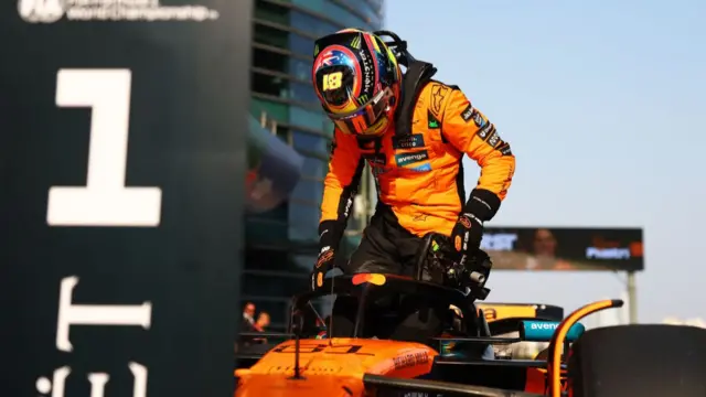 Oscar Piastri getting out of his McLaren