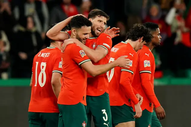 Goncalo Ramos celebrates with teammates