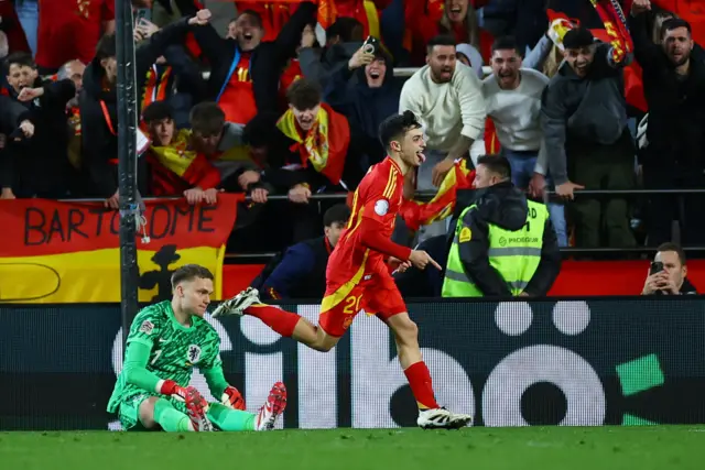 Pedri celebrates scoring a penalty