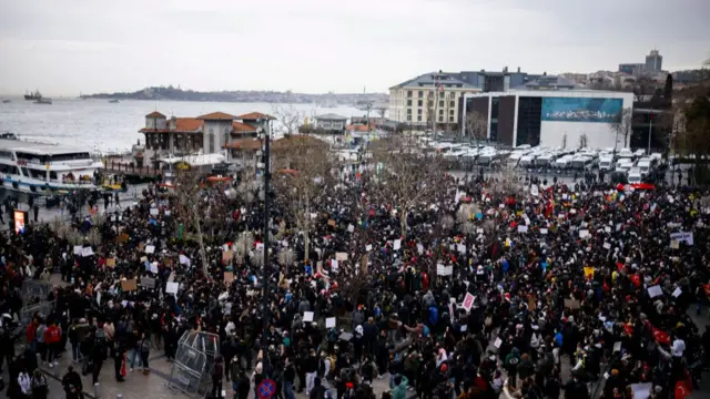 Riot police face students demonstrating in the Besiktas district of Istanbul