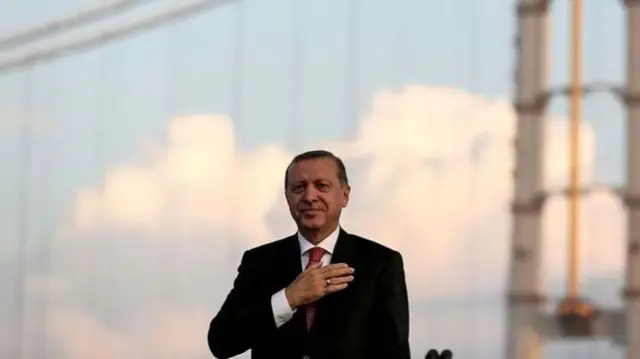 President Erdogan in front of a bridge