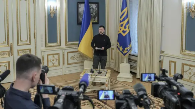 Zelensky giving his reaction earlier today in his office with TV cameras in front