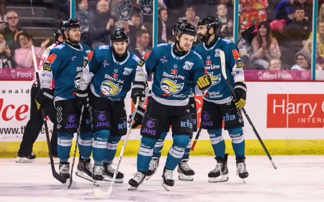 Grant Mismash celebrates scoring for Giants
