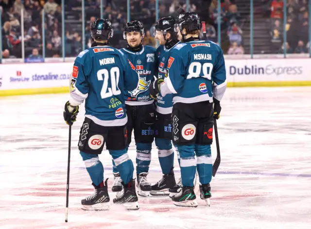 Bobo Carpenter is congratulated after scoring for the Giants
