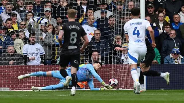Leeds keeper Illan Meslier saves Josh Tymon's penalty