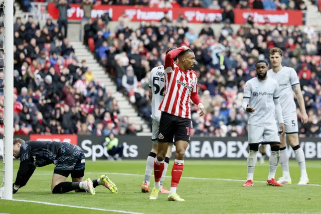 Sunderland's Wilson Isidor reacts after having his effort saved