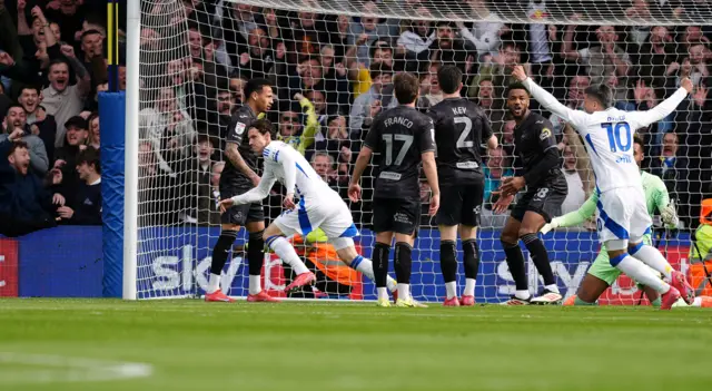 Brenden Aaronson celebrates scoring for Leeds against Swansea
