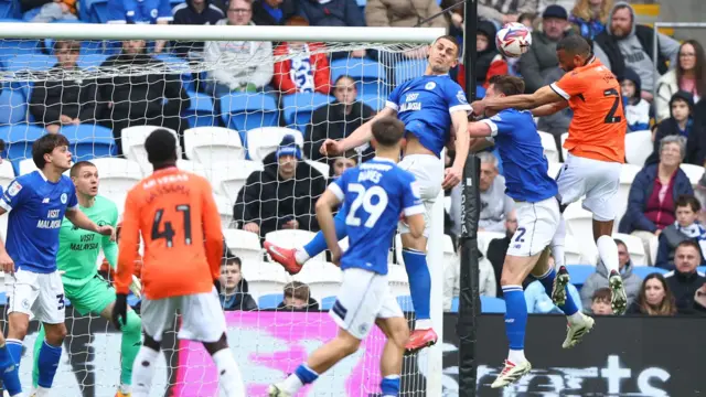 Michael Ihiekwe scores for Sheffield Wednesday at Cardiff