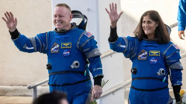 Members of the Nasa Boeing Crew Flight Test Butch Wilmore (L) and Suni Williams (R