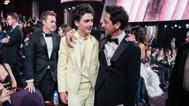 Timothée Chalamet with Adrien Brody, who he lost out to on best actor