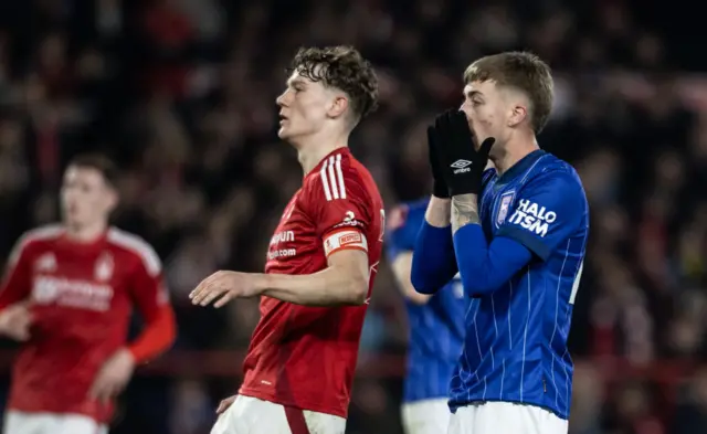 Ipswich Town's Jack Clarke (right) rues a near miss.