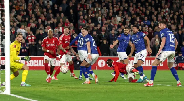Nottingham Forest's Ibrahim Sangare heads at goal.