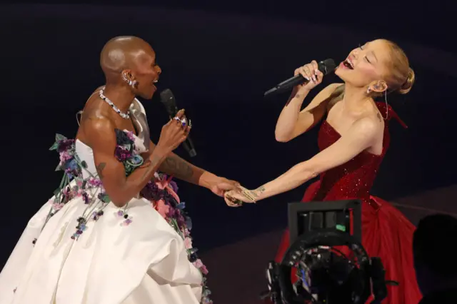 Cynthia Erivo and Ariana Grande perform onstage during the 97th Annual Oscars