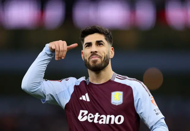 Marco Asensio celebrates after scoring against Cardiff