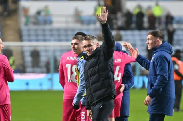 Manager Kieran McKenna, the manager of Ipswich Town, waves to fans after the final whistle during the FA Cup Fourth Round match between Coventry City and Ipswich Town.
