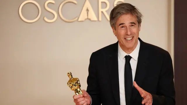 Director Walter Salles poses with the Oscar for Best International Feature Film for "I'm Still Here"