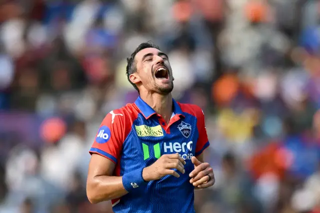Mitchell Starc laughs after taking a wicket for Delhi Capitals in their IPL win over Sunrisers Hyderabad