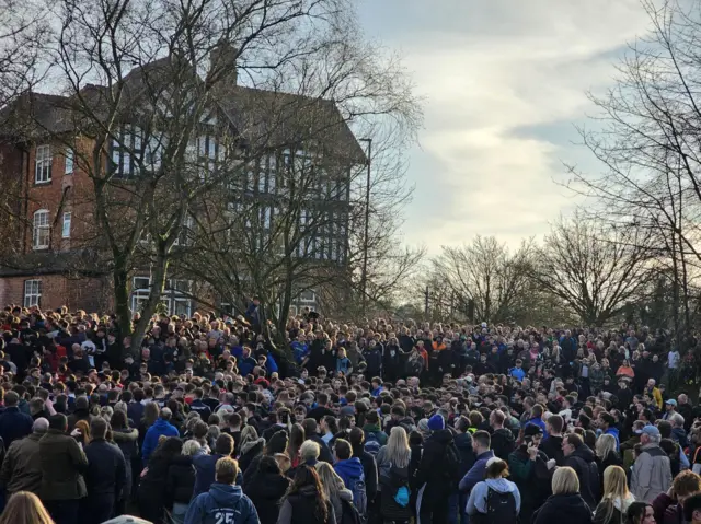 Crowds gathered in the open space