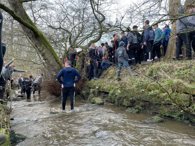 Play is stalled by the watercourse