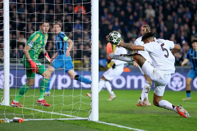 Tyrone Mings of Aston Villa saves on the goal line