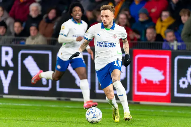 Noa Lang dribbling during PSV Eindhoven's league defeat to Go Ahead Eagles