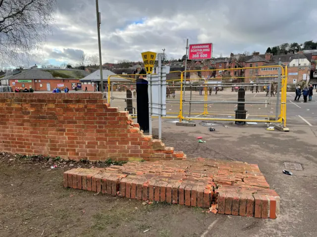 A collapsed wall after the hug got close