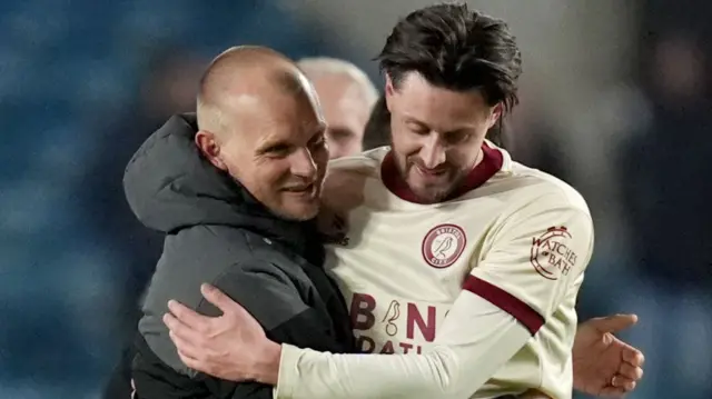 Bristol City manager Liam Manning embraces goalscorer Harry Cornick