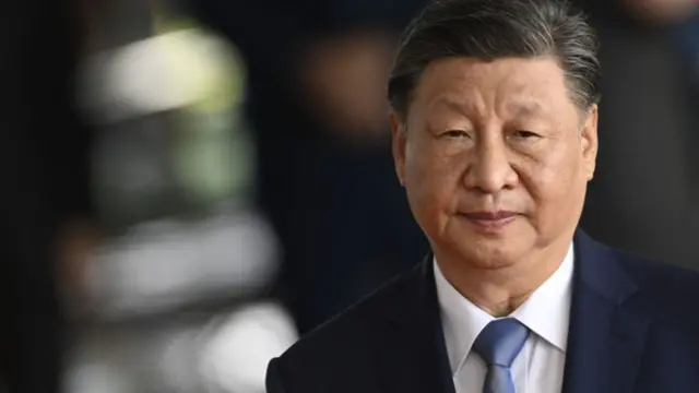 Chinese President Xi Jinping in a navy suit and blue tie at the Alvorada Palace in Brasilia, Brazil