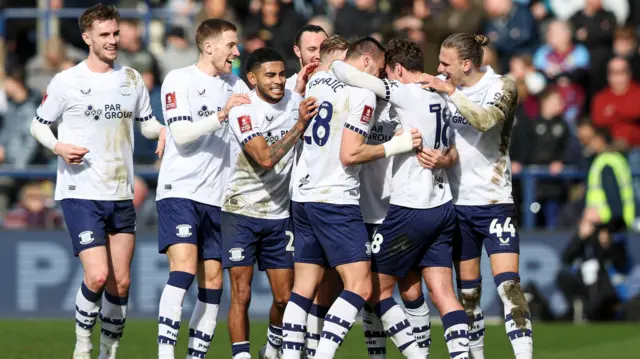 Preston players celebrating scoring in their FA Cup win over Burnley