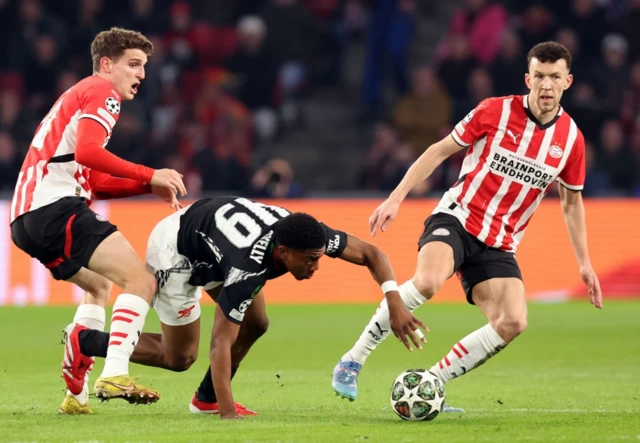 Arsenal's Myles Lewis-Skelly and PSV Eindhoven's Ivan Perisic