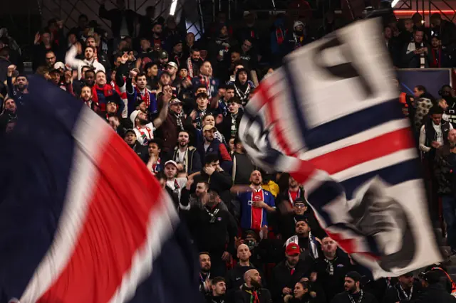 PSG's supporters cheer their team on from the stands