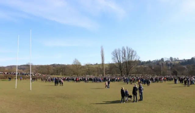 People on rugby pitch