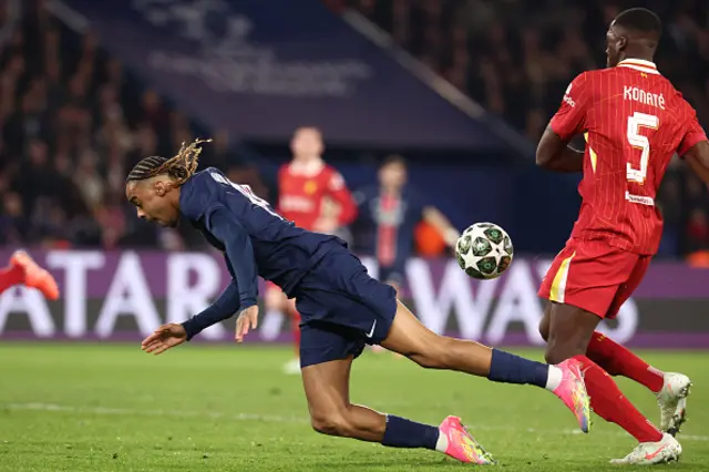 radley Barcola (L) and Liverpool's French defender Ibrahima Konate (R) fight for the ball