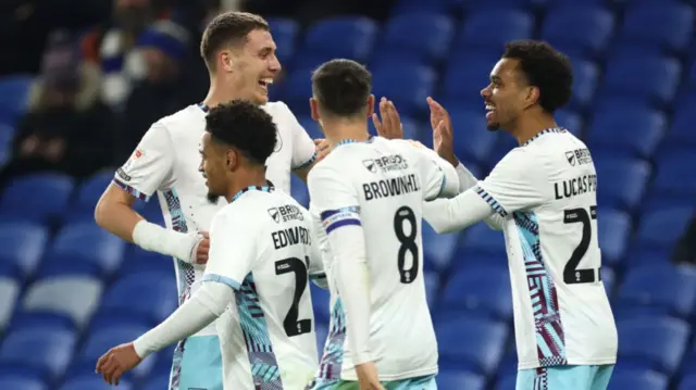 Burnley players celebrate win over Cardiff